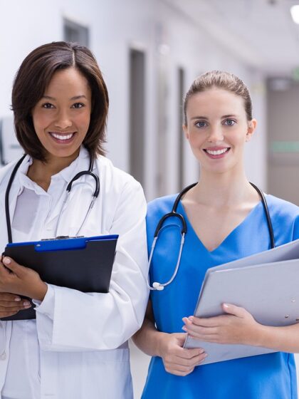 image of two medical providers in a hallway
