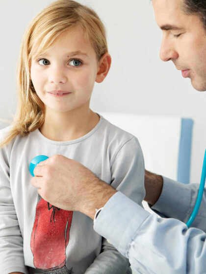 image of a health care provider with a child patient